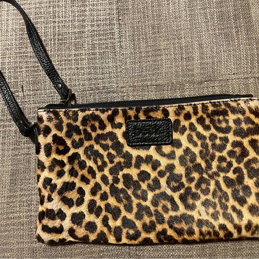 BECK wrostlet leopard print has some wear in the corner